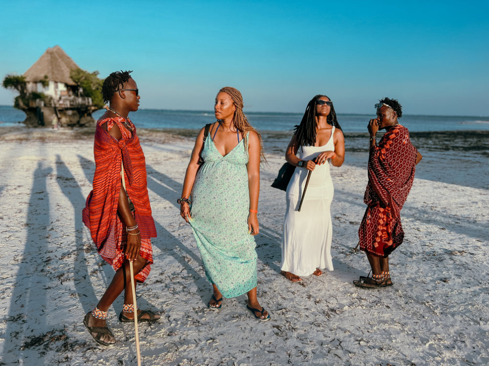 Image of Travellers infront of The Rock Cafe
